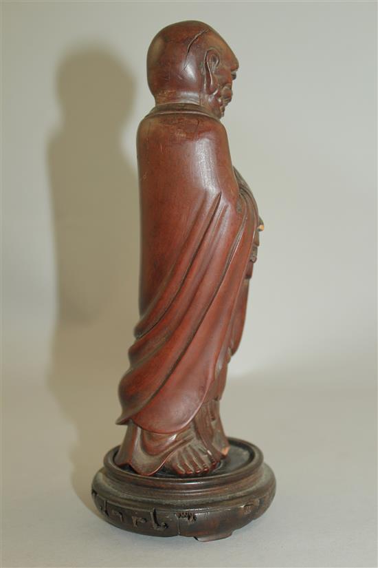 A Chinese hardwood figure of Luohan, 19th century, 18cm